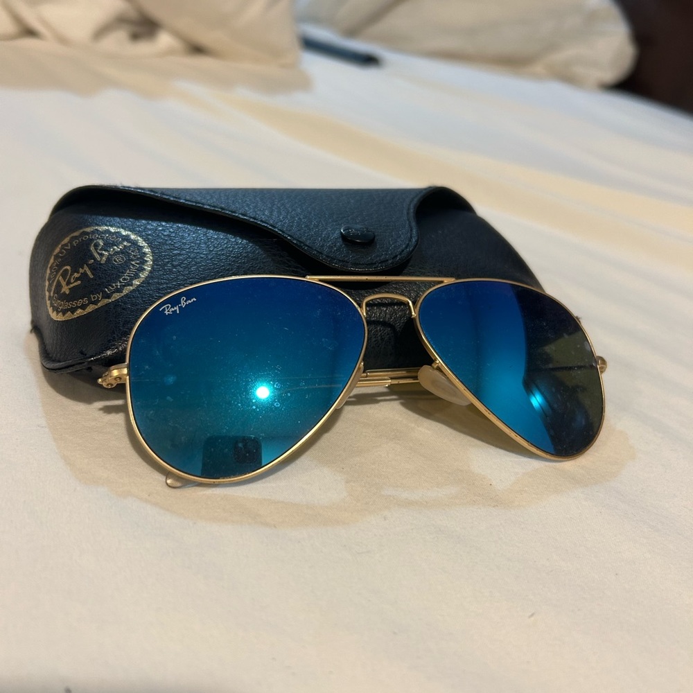 Blue Ray-Bans. Great condition. Comes with cade and cleaner